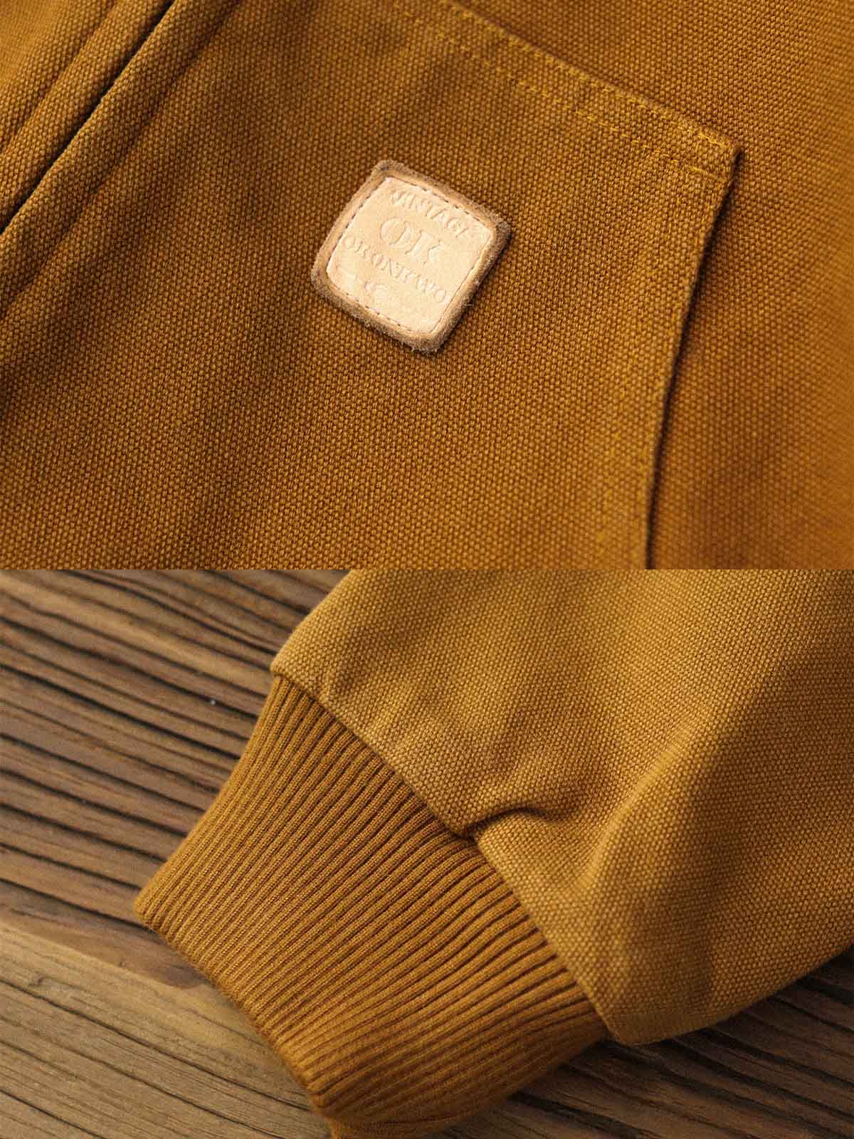 製品画像: J30ジャケットリバイバル版正面展示画像、高密度キャンバス生地とヴィンテージ感を強調。
詳細画像: 高密度16ozキャンバス生地とTALON真鍮ジッパー、左胸のレザータグディテール。