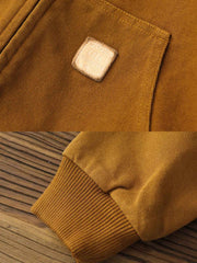 製品画像: J30ジャケットリバイバル版正面展示画像、高密度キャンバス生地とヴィンテージ感を強調。
詳細画像: 高密度16ozキャンバス生地とTALON真鍮ジッパー、左胸のレザータグディテール。