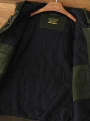 製品画像: J30ジャケットリバイバル版正面展示画像、高密度キャンバス生地とヴィンテージ感を強調。
詳細画像: 高密度16ozキャンバス生地とTALON真鍮ジッパー、左胸のレザータグディテール。