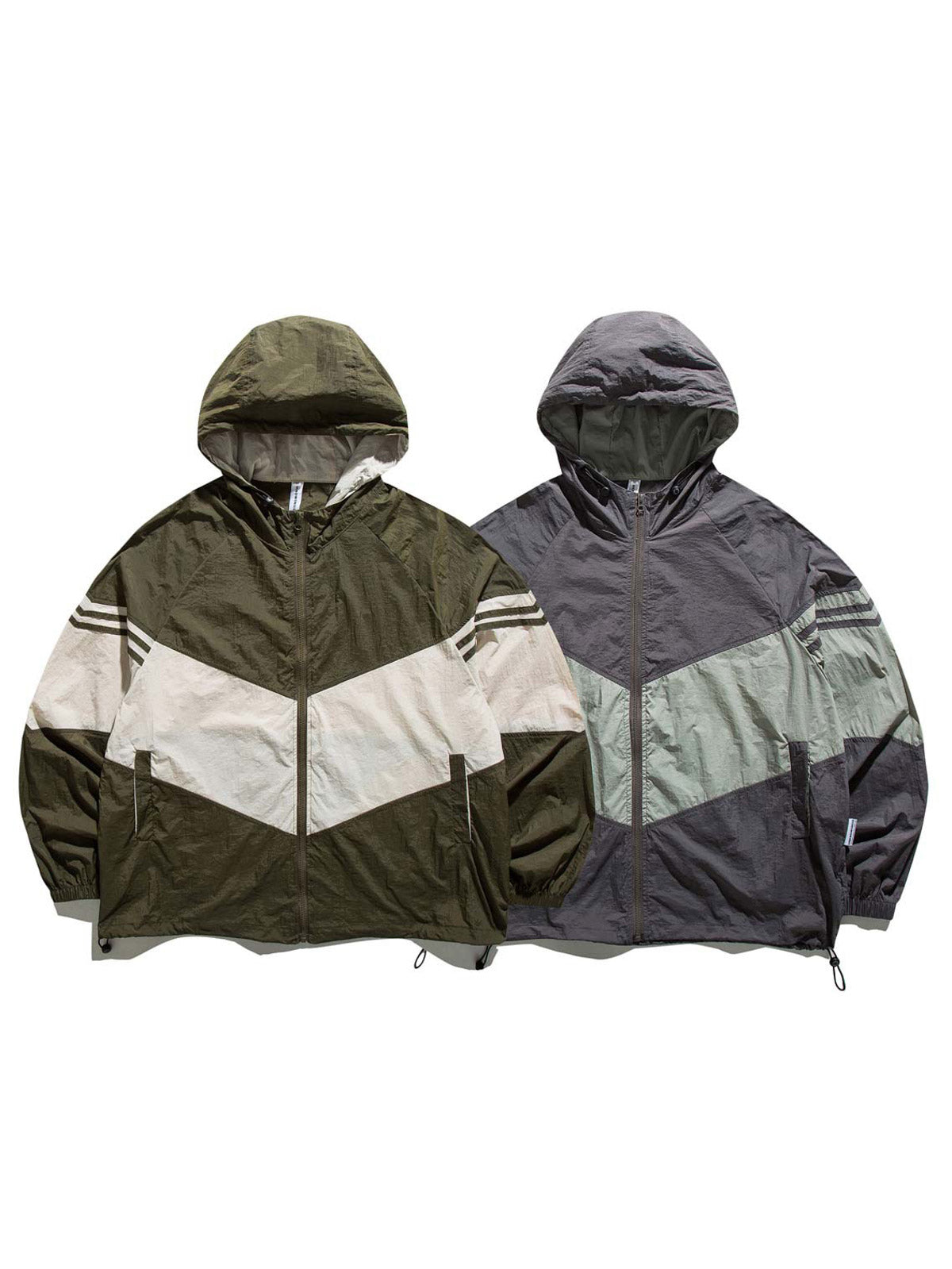 製品画像
「バイカラー フード付き マウンテンジャケットの正面全体図。レトロなスポーツスタイルと現代的なアウトドアデザインを融合したバイカラーデザインが特徴で、防風性・撥水性を備えた100%ポリエステル素材を使用。軽量で日常やアウトドアに適した万能アイテム。」
詳細画像
「バイカラー フード付き マウンテンジャケットのディテール特写。幾何学的なストライプパッチワークデザインが、レトロな配色とモダンな要素を融合し、奥行きのあるスタイルを演出。裾の調節可能なドローコードとゴム仕様の袖口が防寒性と快適さを提供する実用的なデザイン。」