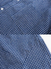 製品画像
「フリンジ加工 チェック柄シャツの正面全体図。ヴィンテージ感あふれるチェックパターンとフリンジヘムのデザインが特徴的で、個性的かつ多用途なスタイルを実現。ルーズフィットのシルエットと柔らかい素材感が快適な着心地を提供する万能アイテム。」
詳細画像
「フリンジ加工 チェック柄シャツのディテール特写。裾部分のフリンジ加工が視覚的なアクセントとなり、ヴィンテージ感を引き立てる。丁寧に作られたボタンと柔らかな素材感が、高い品質と快適さを強調している。」