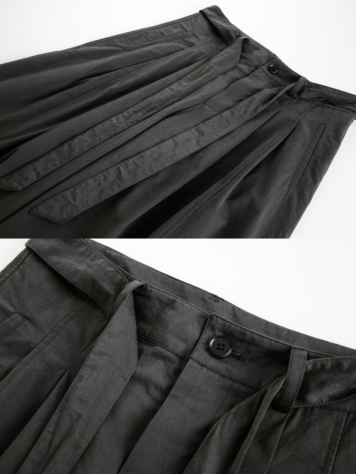 製品画像
黒色のプリーツ入り剣道着スタイルワイドパンツ正面デザイン。剣道着からインスパイアされた結び紐ディテールと前面のプリーツ加工が特徴で、ゆったりとしたワイドシルエットが和の美意識を現代風に表現
詳細画像
腰紐ディテールと流れるような前面プリーツの特写。立体感のあるプリーツ加工と丁寧に仕立てられたコットン素材が、禅の静けさと上品さを際立たせる仕上がり