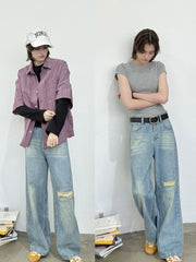 モデル画像: モデルが着用したアメリカンヴィンテージ風の破れストレートジーンズの展示