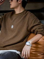 毛織りテクスチャーニットセーター