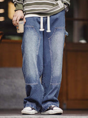 詳細画像:
ダブルニーのパッチ、アンティークゴールドのYKKジッパー、ヴィンテージ感を強調したウォッシュド加工とツイル生地のディテールアップ
モデル画像:
モデルが着用したアメリカンヴィンテージ風ダブルニー ワークデニムパンツ、ルーズフィットのストリートスタイルコーディネート