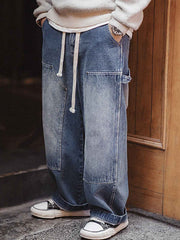 詳細画像:
ダブルニーのパッチ、アンティークゴールドのYKKジッパー、ヴィンテージ感を強調したウォッシュド加工とツイル生地のディテールアップ
モデル画像:
モデルが着用したアメリカンヴィンテージ風ダブルニー ワークデニムパンツ、ルーズフィットのストリートスタイルコーディネート