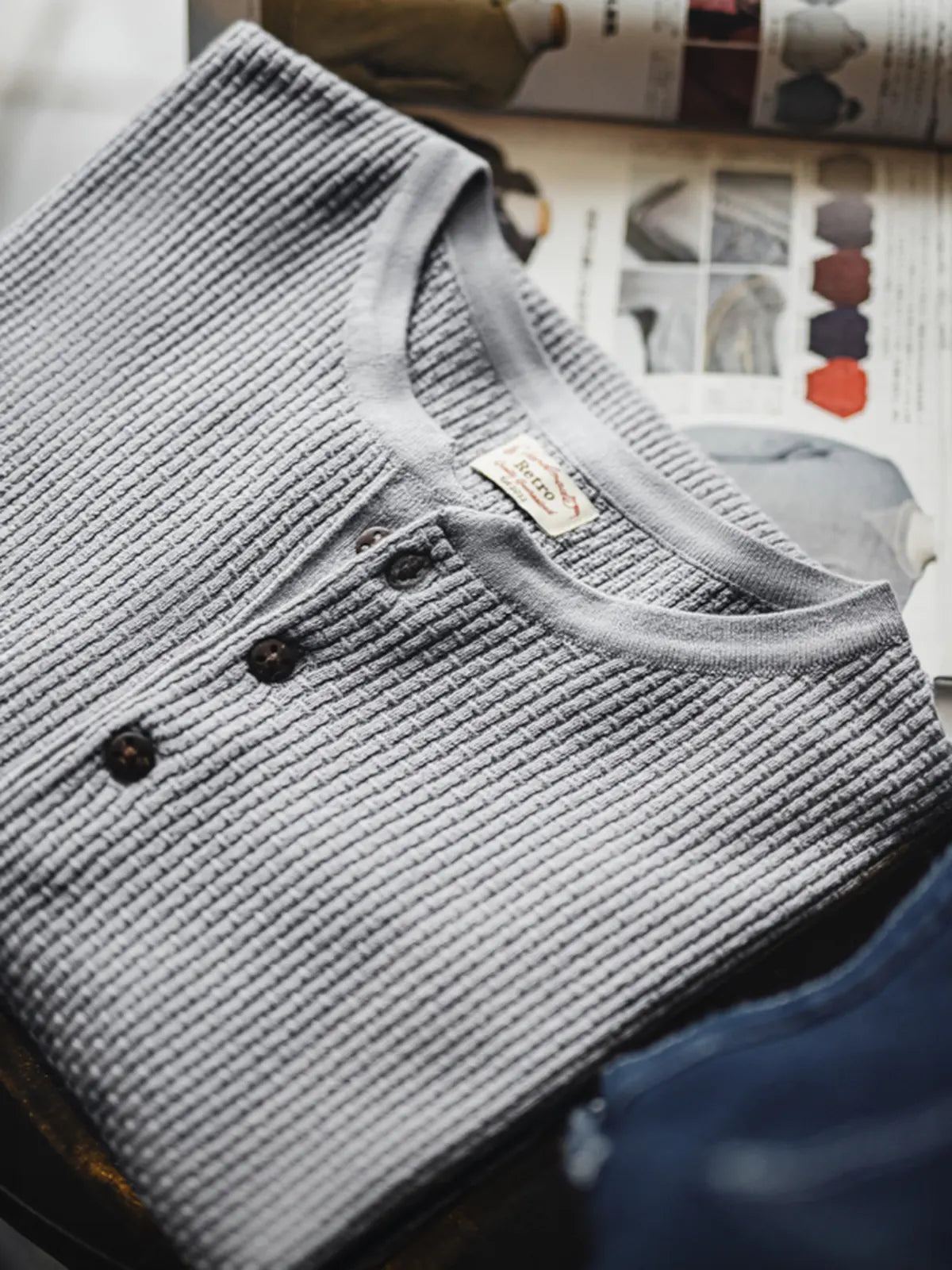 フロント全体の竹節編みヘンリーショートスリーブニット