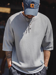 フロント全体の竹節編みヘンリーショートスリーブニット