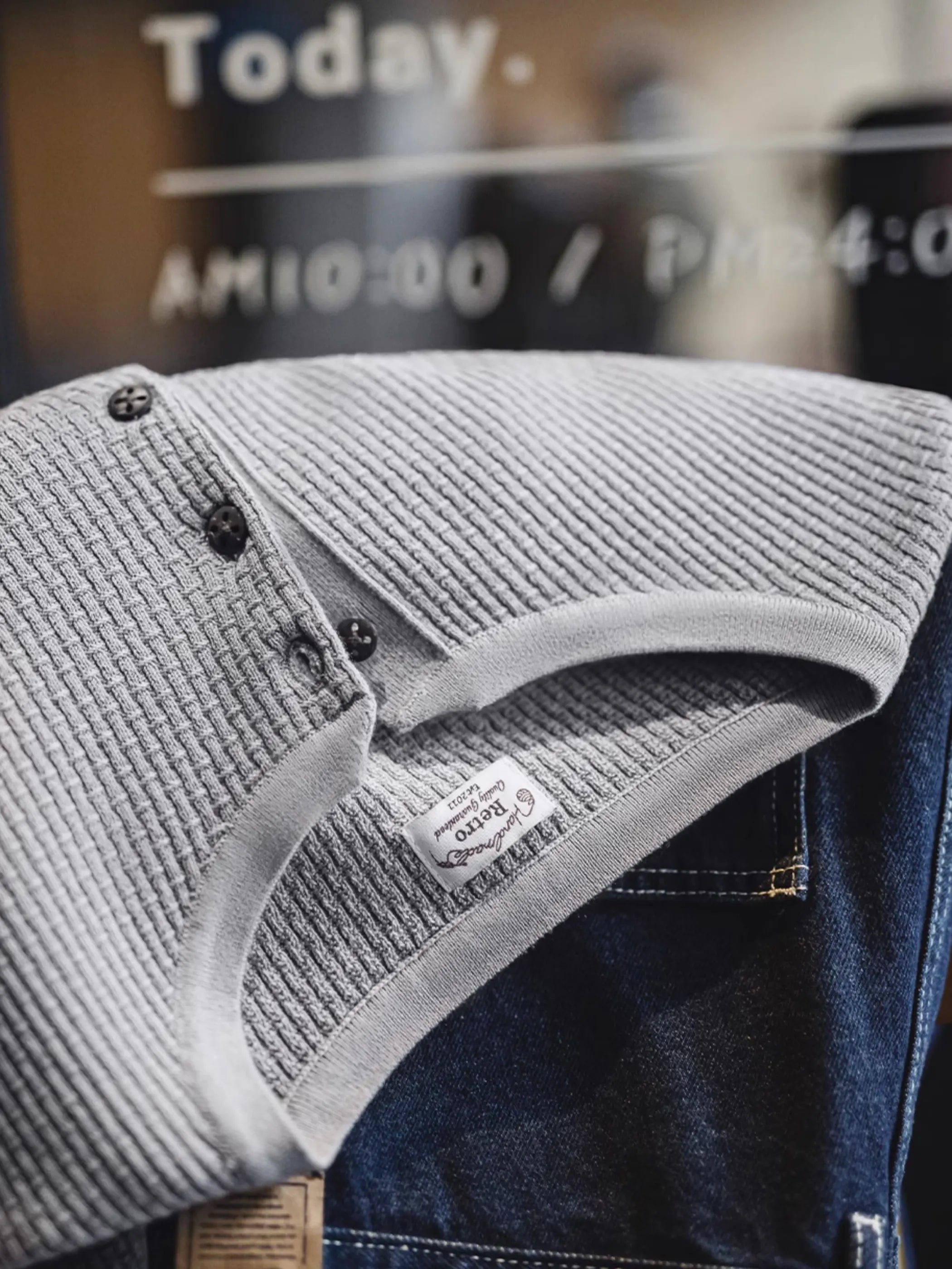 フロント全体の竹節編みヘンリーショートスリーブニット