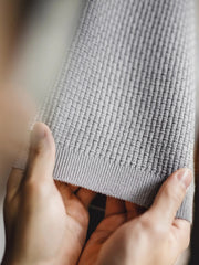 フロント全体の竹節編みヘンリーショートスリーブニット