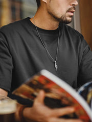 ボックスシルエットの無地ヘビーウェイトTシャツ。カラーはブラック、オフホワイト、オートミールの3色