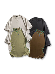 ラグラン切り替えと配色ステッチが施された半袖Tシャツ