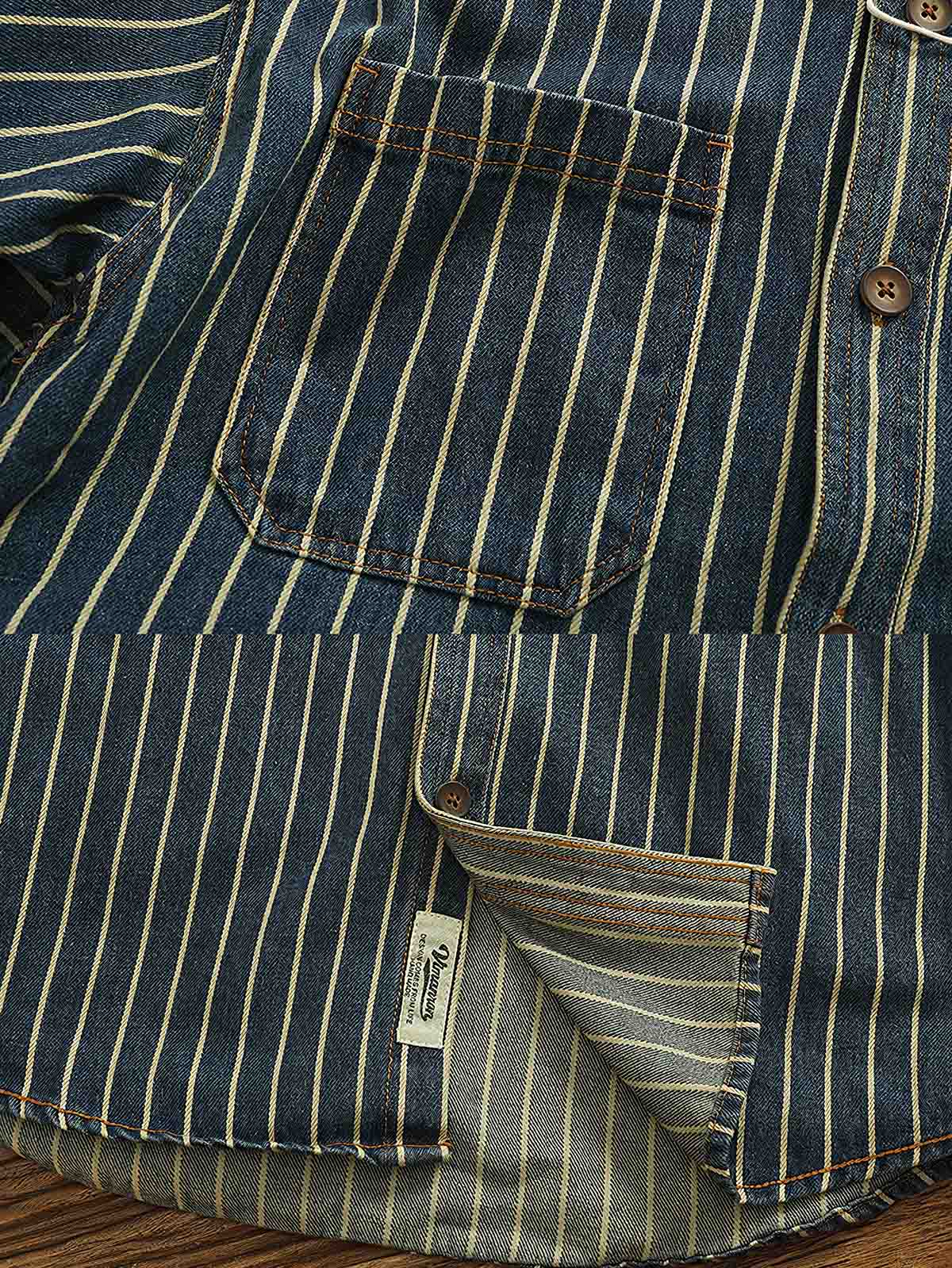 製品画像: ヘビーストライプデニムワークシャツの正面展示
詳細画像: 肘のパッチとストライプのディテールクローズアップ
モデル画像