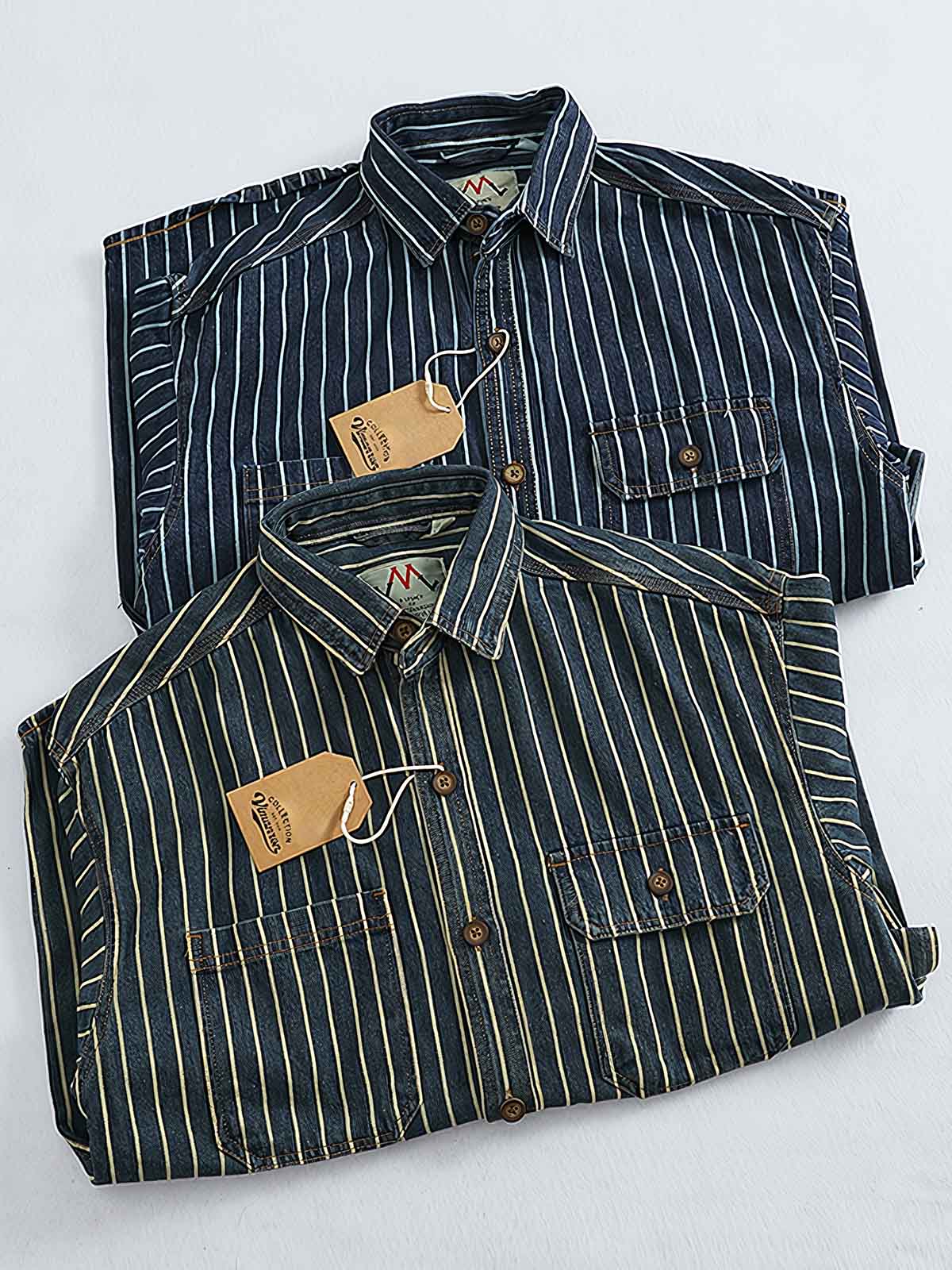 製品画像: ヘビーストライプデニムワークシャツの正面展示
詳細画像: 肘のパッチとストライプのディテールクローズアップ
モデル画像