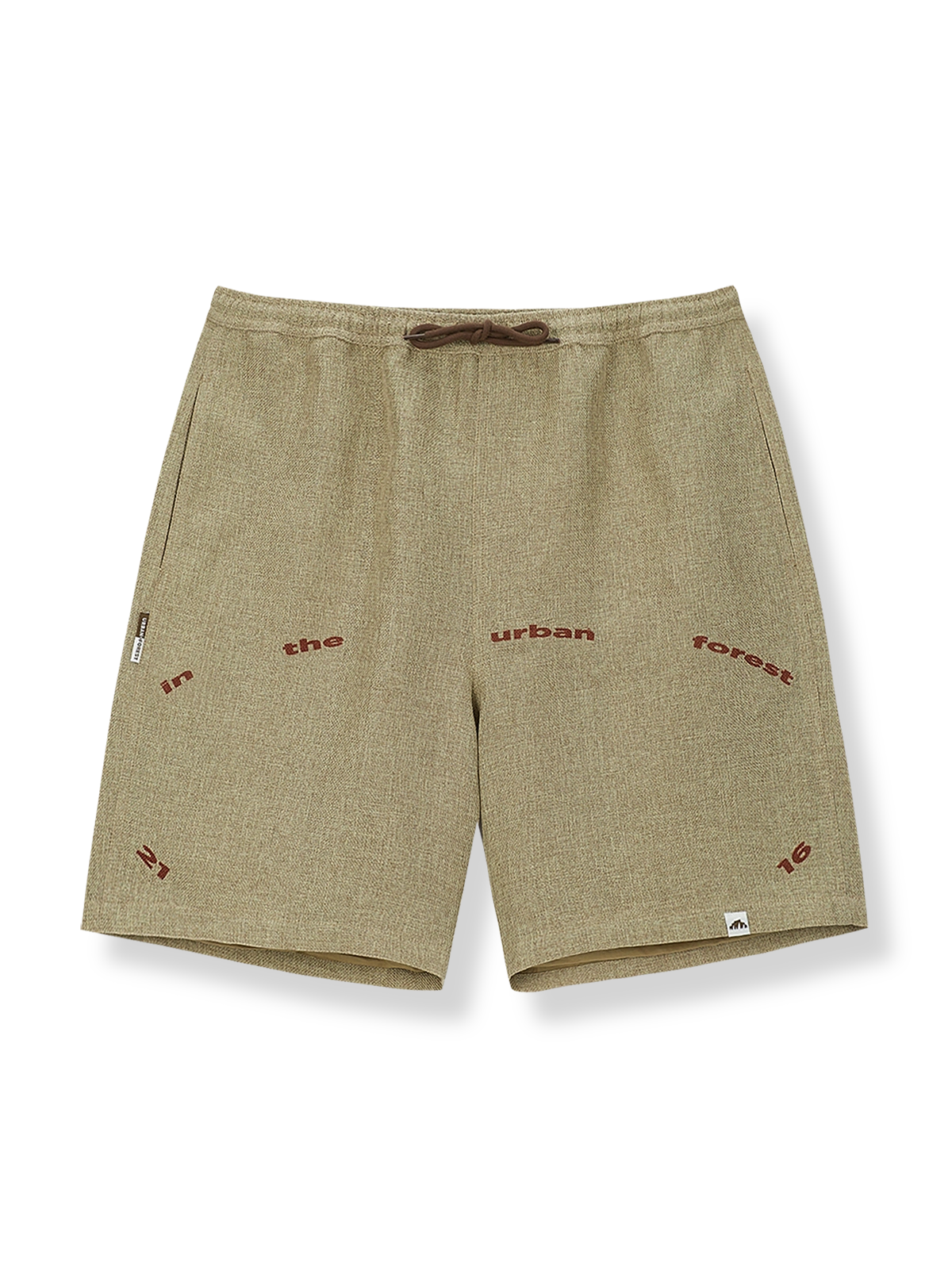 プリントラフィアショーツの正面図、中性的なルーズフィットと独特なフラグメントプリントを展示