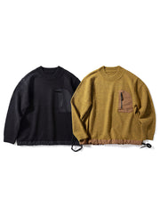 製品画像
「ウール混紡ニットセーター、バイカラー切り替えデザインと防水ナイロン裾、粗い五本針編みで重厚感を演出し、高い保温性を提供。ジッパーポケットと太めドローコードによる実用性と視覚的アクセントが特徴。」
詳細画像
「粗い五本針編みで編まれたウール混紡ニット、ジッパーポケットが胸元に配置され、防水ナイロン裾で耐久性と防水性を実現。裾の太めドローコードで調整可能なフィット感。」