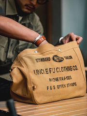 英字 キャンバス ショルダーバッグ