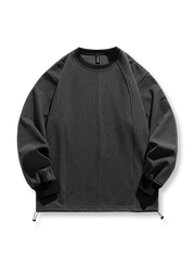 製品画像: "ストライプのルーズバイカラスウェットシャツの正面ビュー、カジュアルでストリート風のトップス"
詳細画像: "袖口と裾のバイカラーデザインの詳細、ストライプルーズプルオーバースウェット"