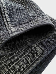 詳細画像: 刺し子の二重織り生地と天然牛角ボタンのディテール