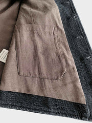 詳細画像: ショールカラーとタイトフィットデザインのディテール