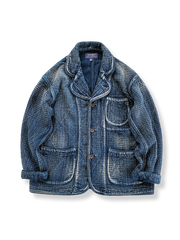 製品画像: Indigo 藍染め 刺子織り カジュアルブレザー全体写真。天然植物藍染めと刺子織りの伝統工芸が際立つヴィンテージスタイルのブレザー。
詳細画像: 刺子織りのピースワークデザインと天然本牛角ボタンの高品質ディテールを強調した写真。深みのある藍色が特徴。