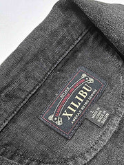 製品画像:バティック染めヴィンテージリネンジャケットの正面画像
詳細画像:袖口に施されたヴィンテージ風ボタンと色落ち加工のディテール