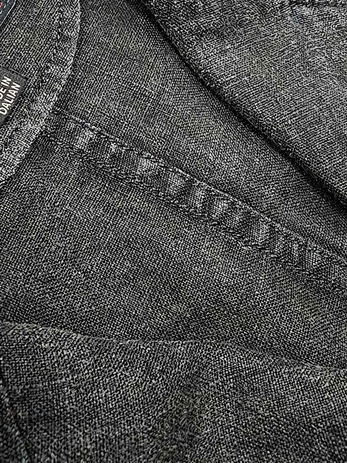 製品画像:バティック染めヴィンテージリネンジャケットの正面画像
詳細画像:袖口に施されたヴィンテージ風ボタンと色落ち加工のディテール