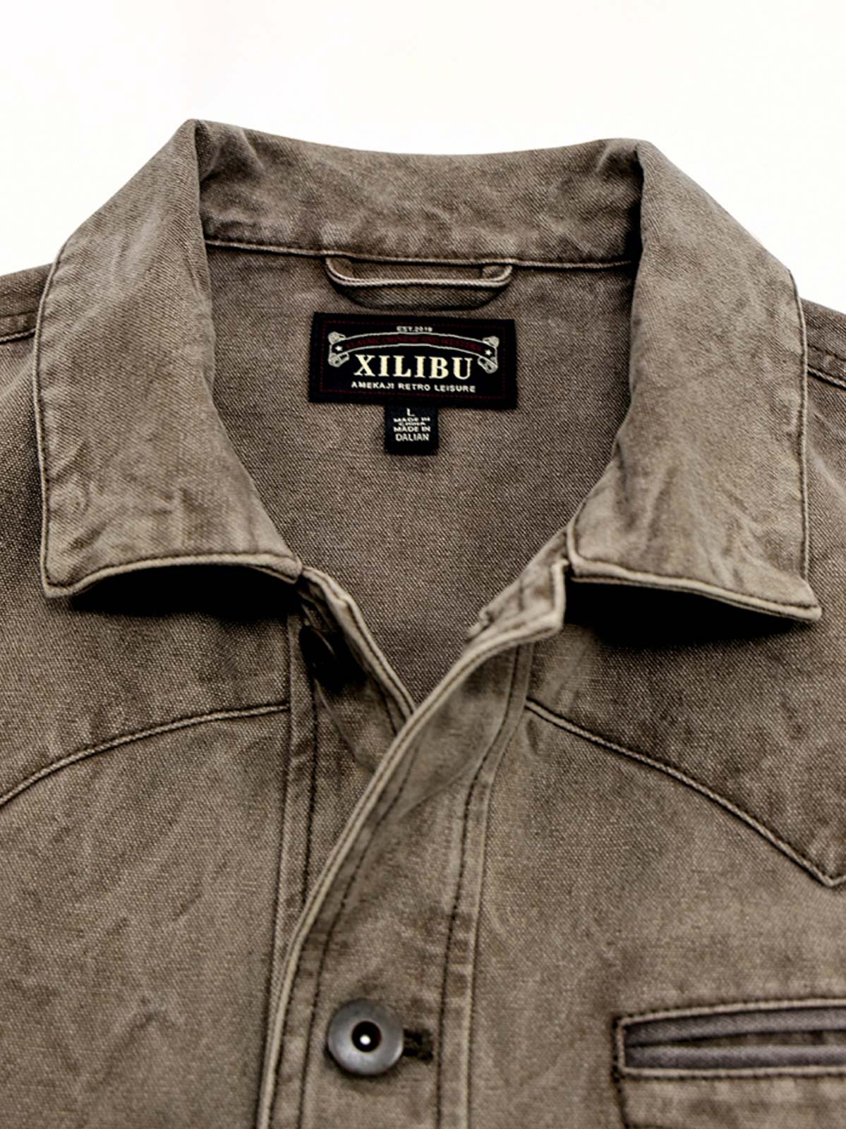 製品画像:アメカジスタイルのヴィンテージ重洗いキャンバスワークジャケット
詳細画像:ヴィンテージ加工の金具と工字ボタンディテール