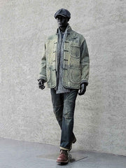 詳細画像: 刺子織りの繊細なテクスチャと藍染めの深みある色合いを強調したディテール写真。水洗抜染加工による個性的な風合いを表現。
モデル画像: 藍染め刺子織りスタンドカラージャケットを着用したモデルによる、レトロで上品なスタイリング写真。