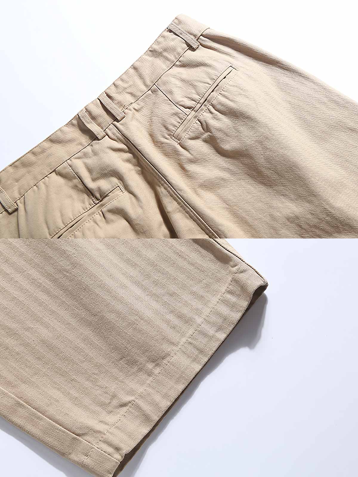 詳細画像: ヘリンボーンのディテールとパンツの裾デザインの特写