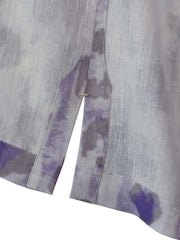 シャツのパープルペタルグラデーションプリントとボタンのディテール