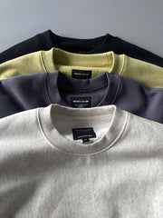 製品画像: ライムイエロー起毛裏起毛スウェットシャツの正面画像、快適で暖かいデザインが特徴。
詳細画像: 胸ポケットと起毛生地のディテール画像、柔らかな質感が際立つ。