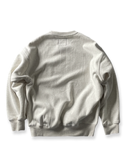 製品画像: ライムイエロー起毛裏起毛スウェットシャツの正面画像、快適で暖かいデザインが特徴。
詳細画像: 胸ポケットと起毛生地のディテール画像、柔らかな質感が際立つ。