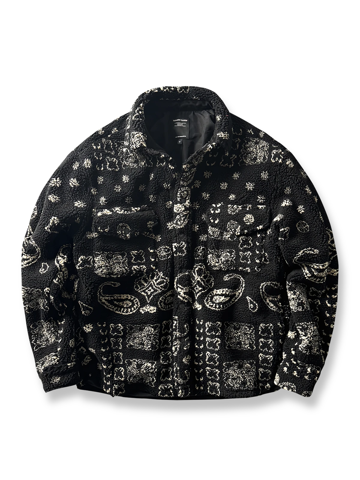 製品画像: ヴィンテージトライバルパターン シープボアシャツの正面画像、トライバルパターンが際立つデザイン。
詳細画像: シープボア素材とトライバルパターンのディテール画像、ヴィンテージ感を強調。