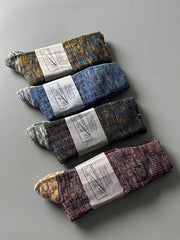 製品画像: カラーミックスヴィンテージロングソックスの5足セット展示、カジュアルで暖かいデザインが特徴。
詳細画像: カラフルなミックス糸で編まれた太糸ソックスのディテール画像、ヴィンテージ感を強調。