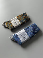 製品画像: カラーミックスヴィンテージロングソックスの5足セット展示、カジュアルで暖かいデザインが特徴。
詳細画像: カラフルなミックス糸で編まれた太糸ソックスのディテール画像、ヴィンテージ感を強調。