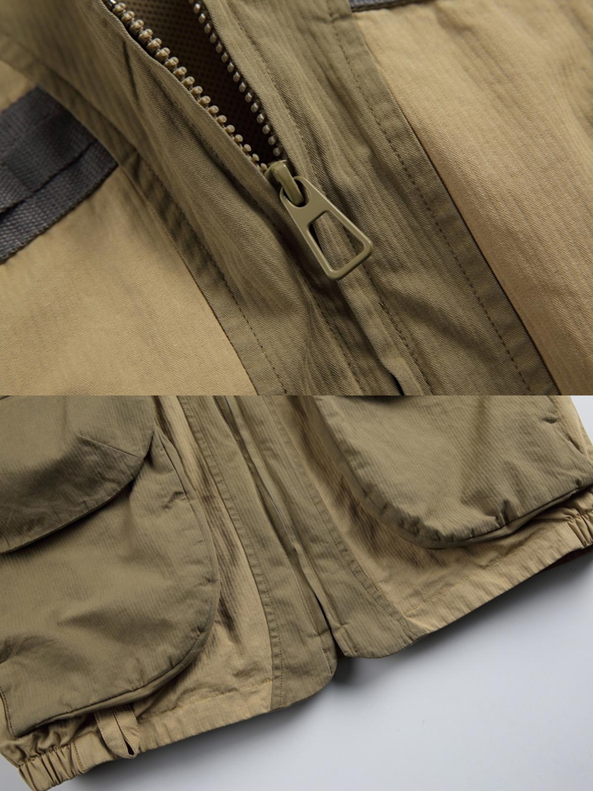 ノマドジャーナリストシャツの正面デザイン。1954年ベトナム戦争時のAP通信戦地カメラマンの装備を再現したミリタリーギア風デザインで、3つのフラップ付きポケットと軽量梭織(しょうしょく)生地が特徴的
詳細画像
マットな5本爪スナップボタンと、戦地カメラマンの実用性を考慮して配置された3つのフラップ付きポケットのディテール特写。独自のシワ加工が施され、経年変化を楽しめる仕上がり