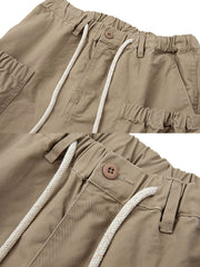 ショーツの大きなポケットとドローコードのディテール