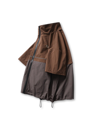 上下で色が切り替えられたショートスリーブのコーチシャツ、フロントはフルジップ仕様