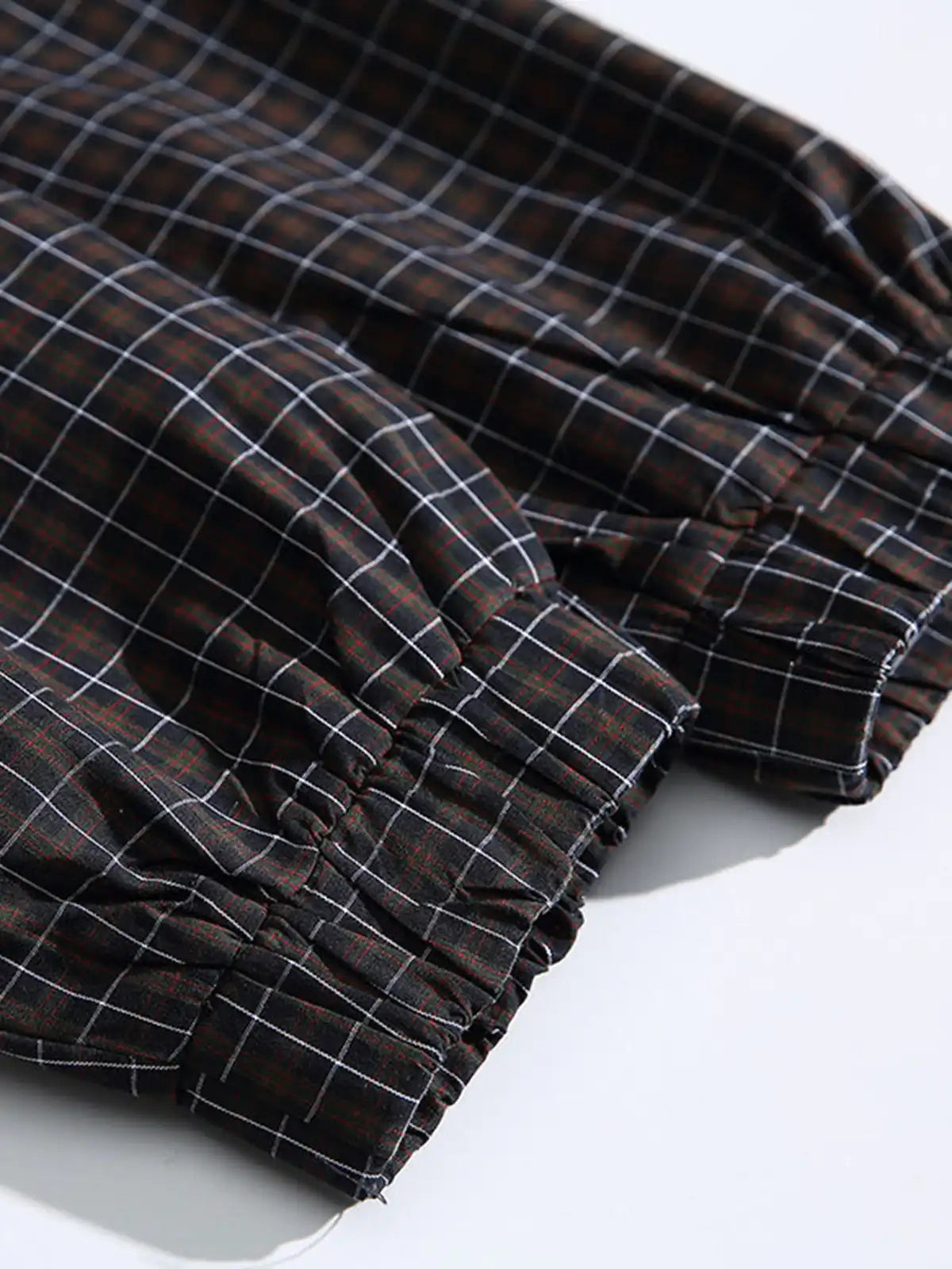 格子柄のフード付きジャケット、配色切り替え部分あり