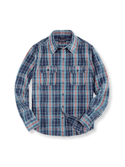 ヴィンテージウォッシュ加工のチェック柄とフラップポケットが特徴のルーズフィットコットンシャツ