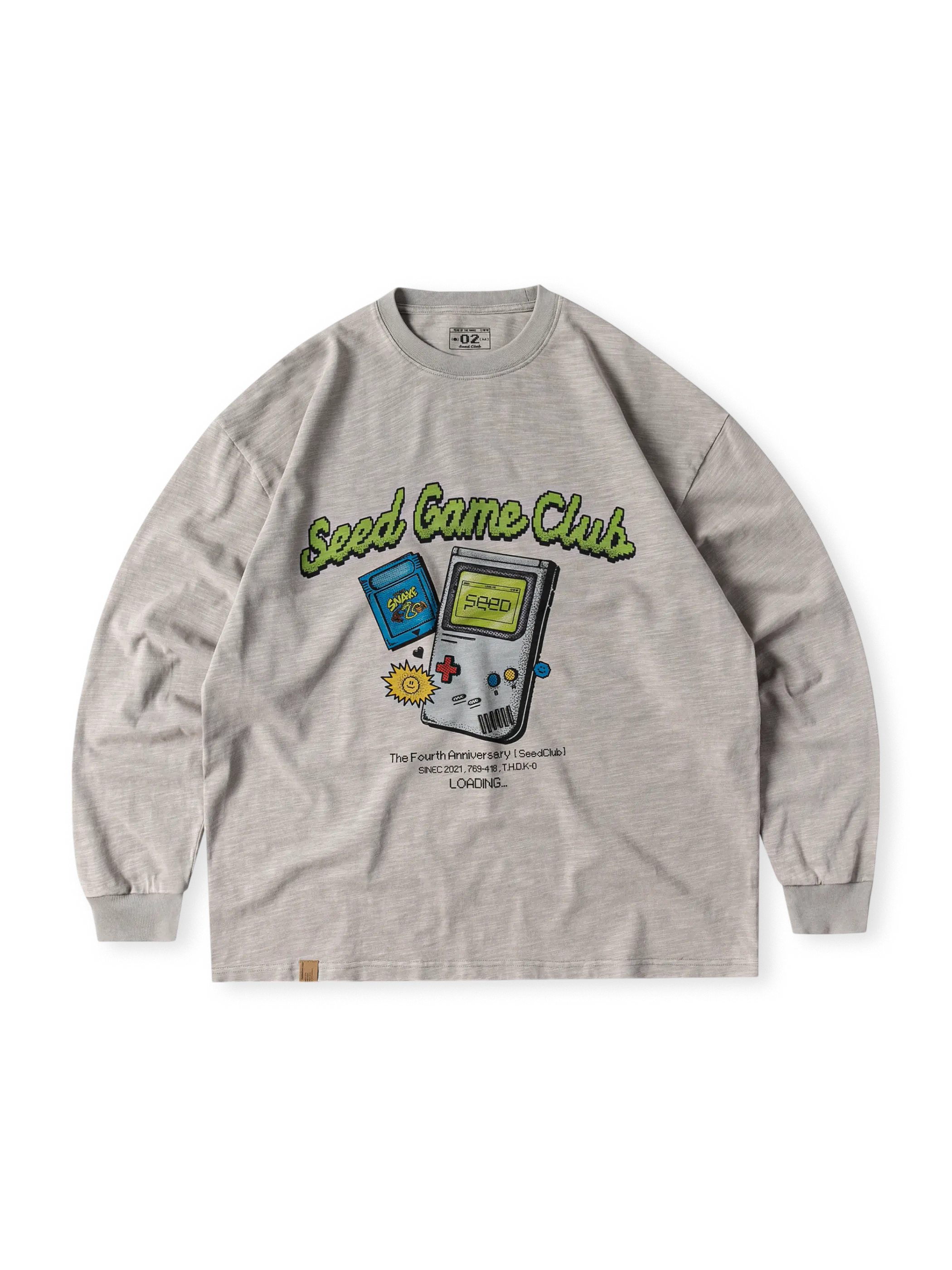 古布機織りテクスチャーとヘビのゲームモチーフが特徴の長袖Tシャツ。厚手リブ付き。