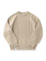 バルーンスリーブとチェック柄ツイスト編みが特徴の厚手ニットセーター。