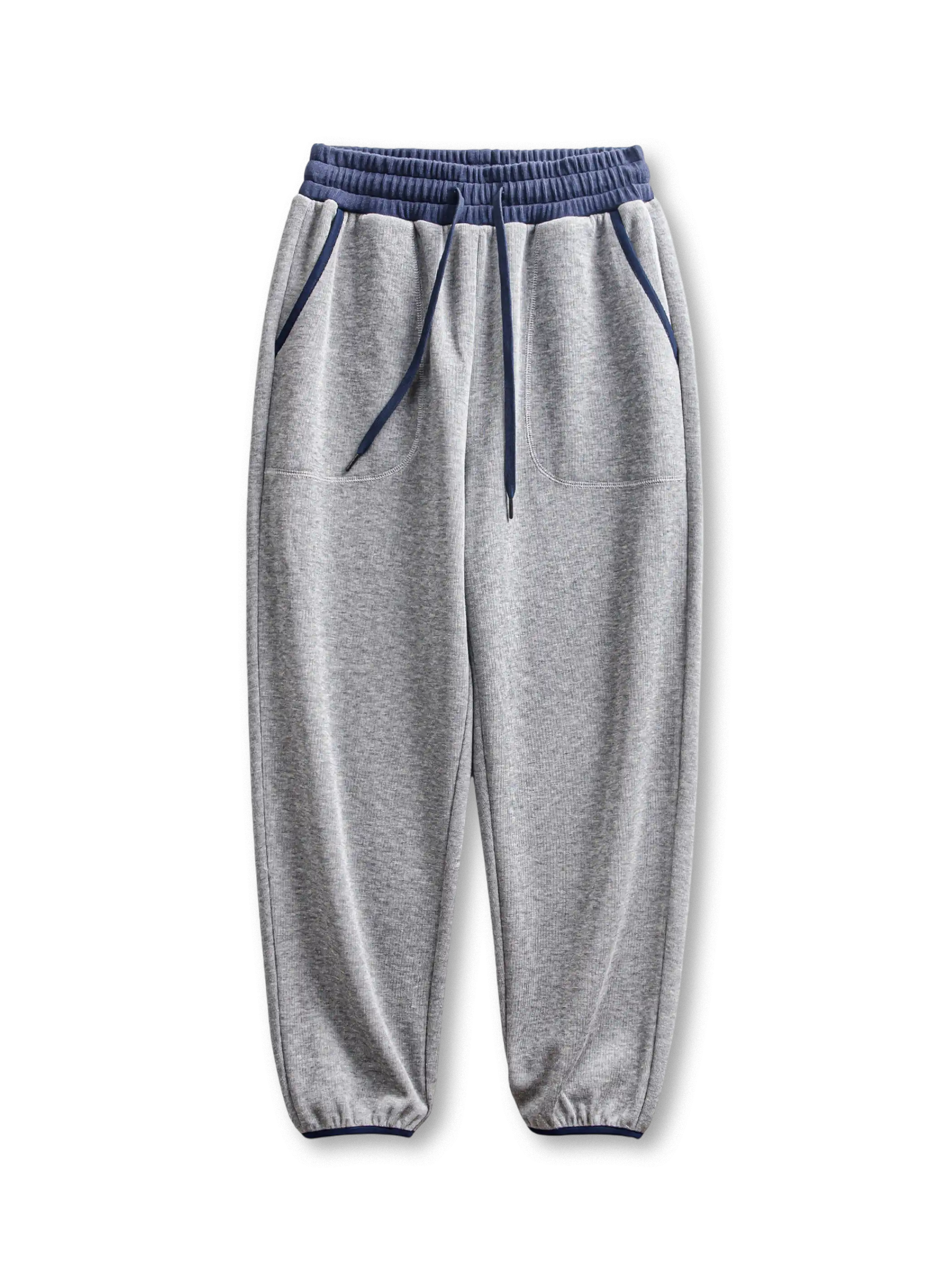 バイカラーリブとジョガーシルエットが特徴の裏起毛厚手パンツ。保温性と快適さを兼ね備えています。