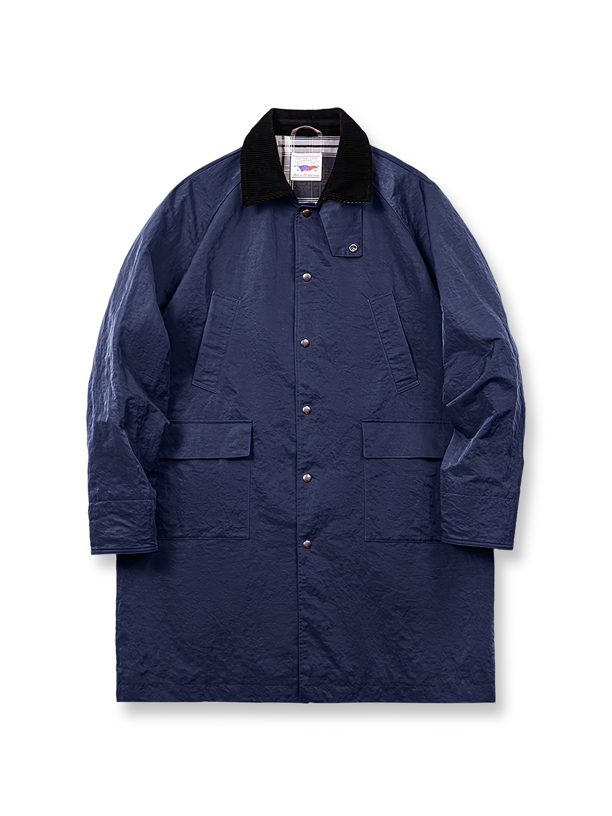 ツイル生地とコーデュロイラペルが特徴のハンティング風コート