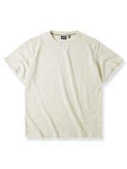 格子状のワッフル織りとベージュカラーが特徴のクラシックワッフルニットTシャツの画像。