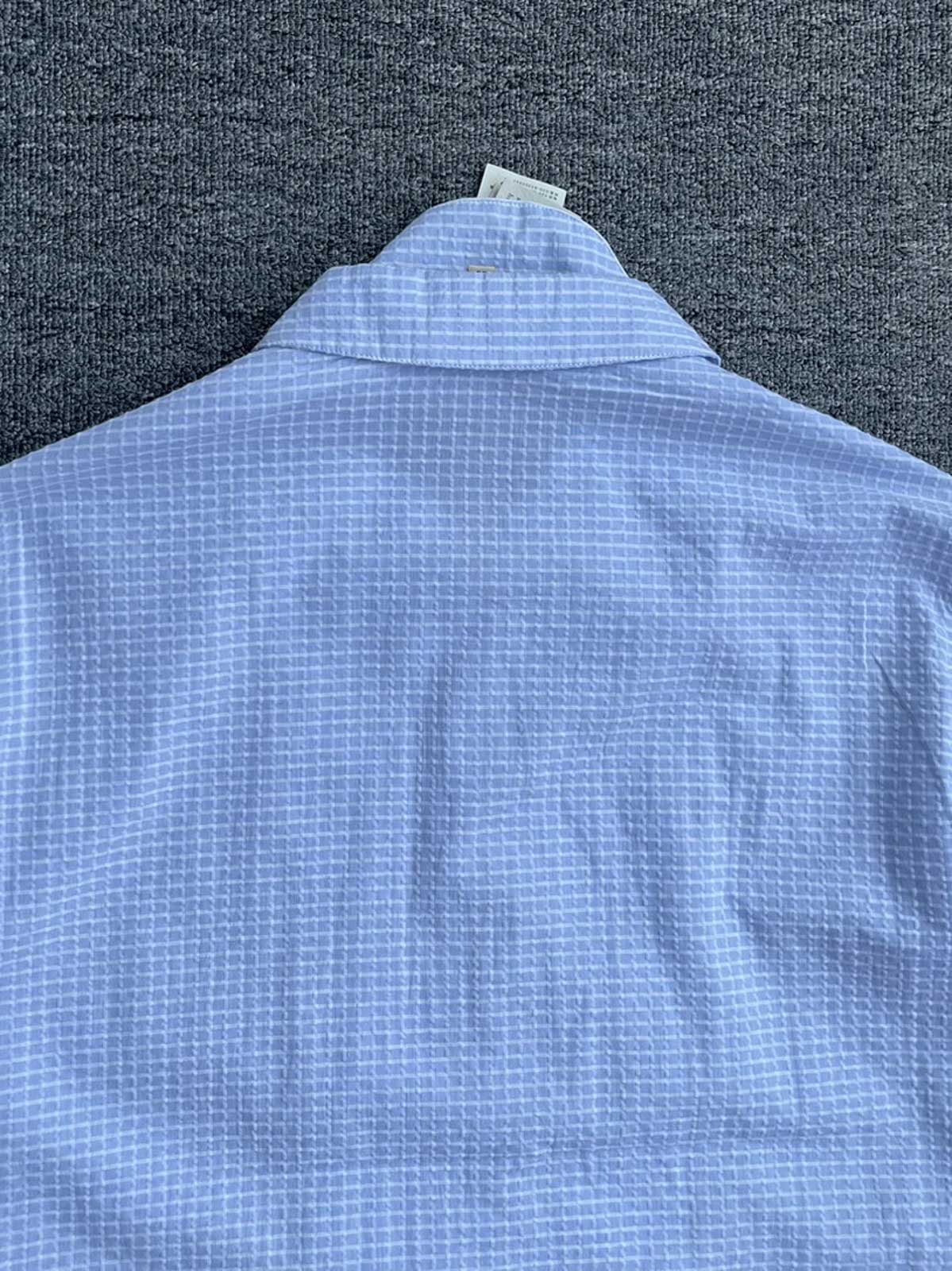 製品画像:Cleanfitシアサッカースタンドカラージャケット全体の外観
詳細画像:袖口ボタンとシアサッカー素材の質感ディテール