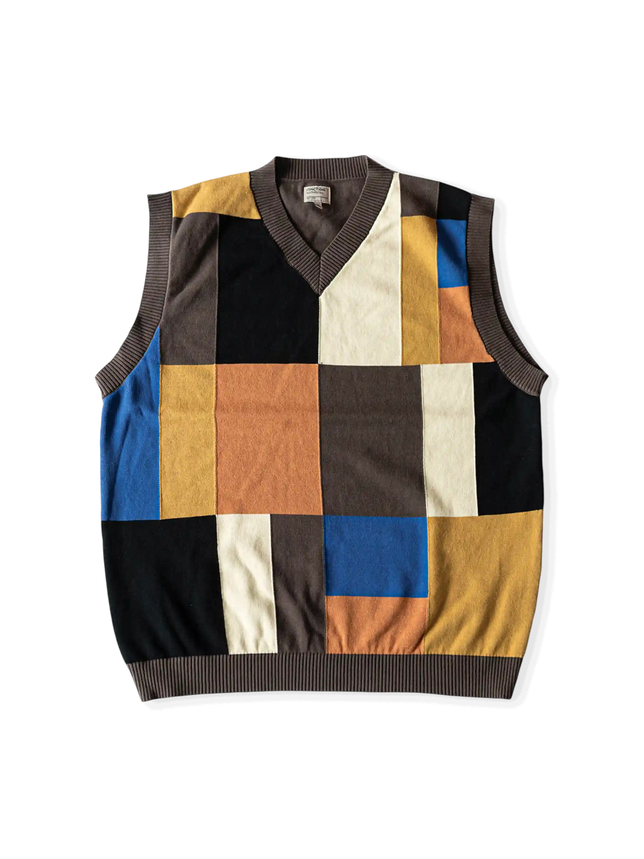 100%高捻綿糸使用、七色ブロックパッチのチェッカーボードデザインニットベスト。ルーズフィットボックスシルエット。