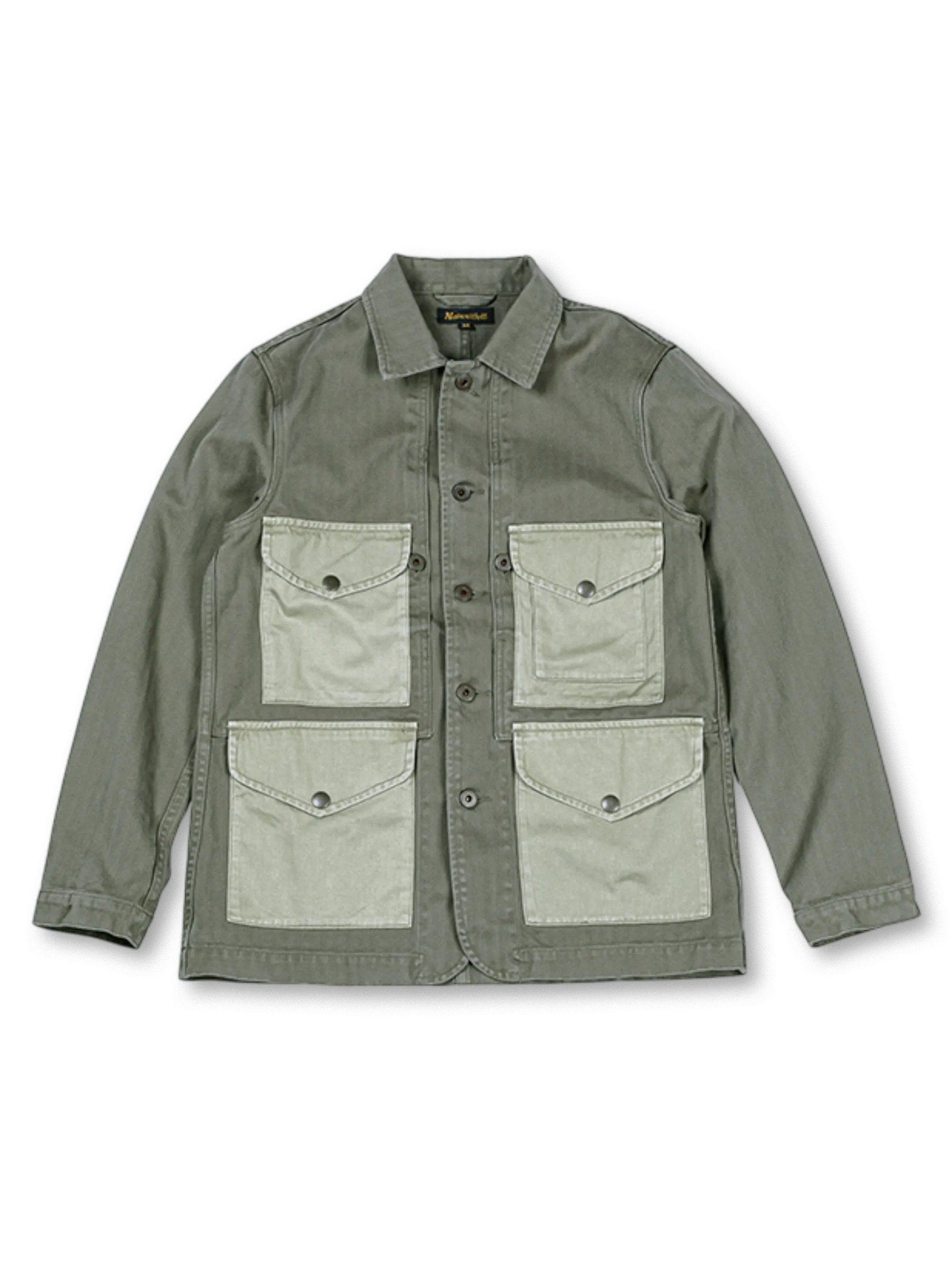 伝統的ハンティングジャケット着想の100%コットンツイード製カラーブロックジャケット。大容量ポケット付き。