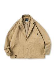 コーデュロイ風素材とパッチポケットが特徴のテーラードワークジャケット